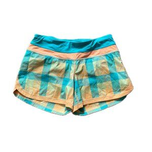Lululemon running shorts, NEON turquoise, yellow, and orange checkered pattern